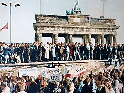 250px West And East Germans At The Brandenburg Gate In 1989